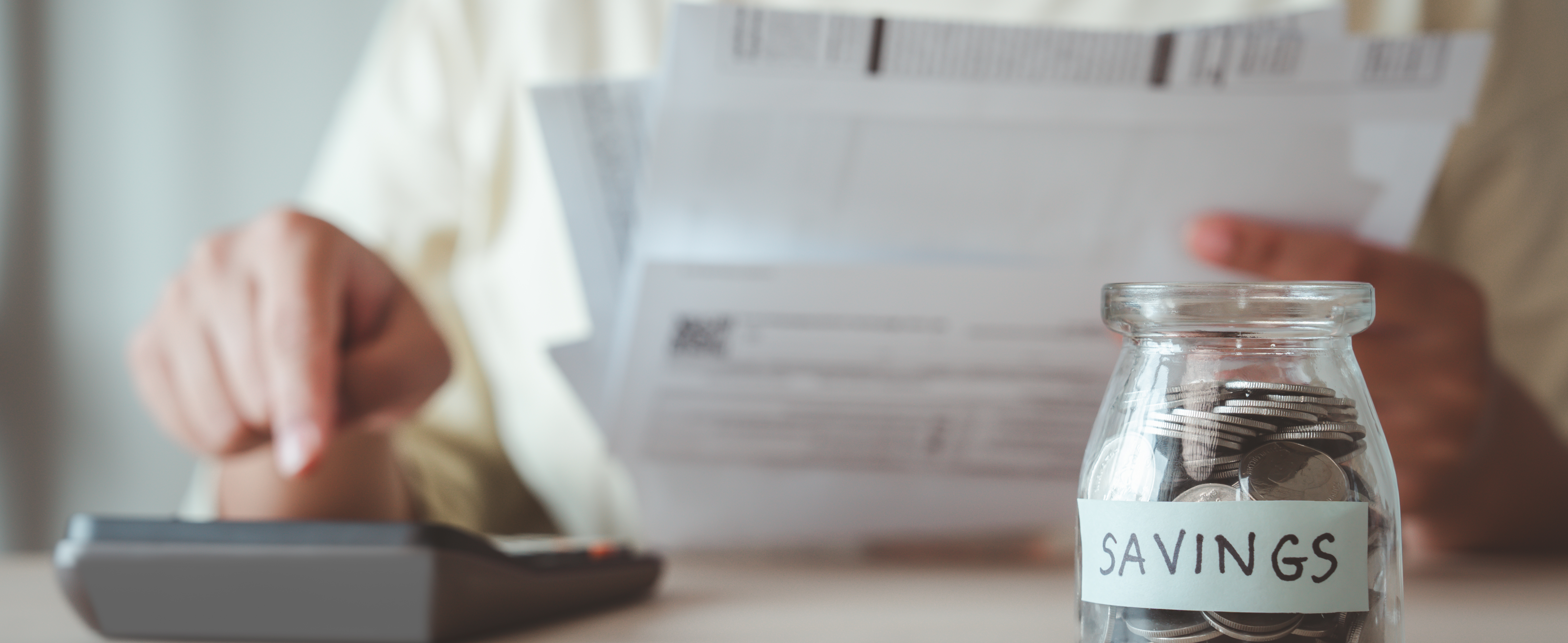 a woman calculating if she needs a home warranty
